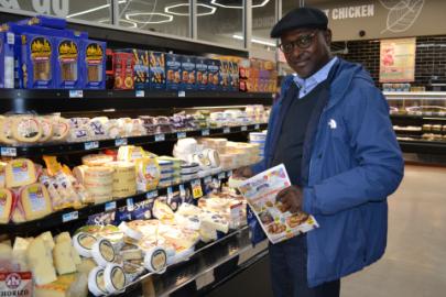 Shopper Oumar Cisse Foodtown Cheese Case Carousel