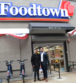Foodtown of Astoria Store Owners Ennis and Rowhie Said Carousel